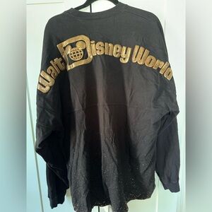 Spirit Jersey Walt Disney World shirt. Xl. Black with puffed gold letters.